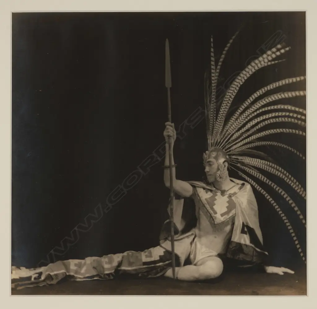 Unidentified photographer 'Male dancer in 'Aztec' costume with spear', USA c.1930, toned gelatin silver photographic pri Image 1++